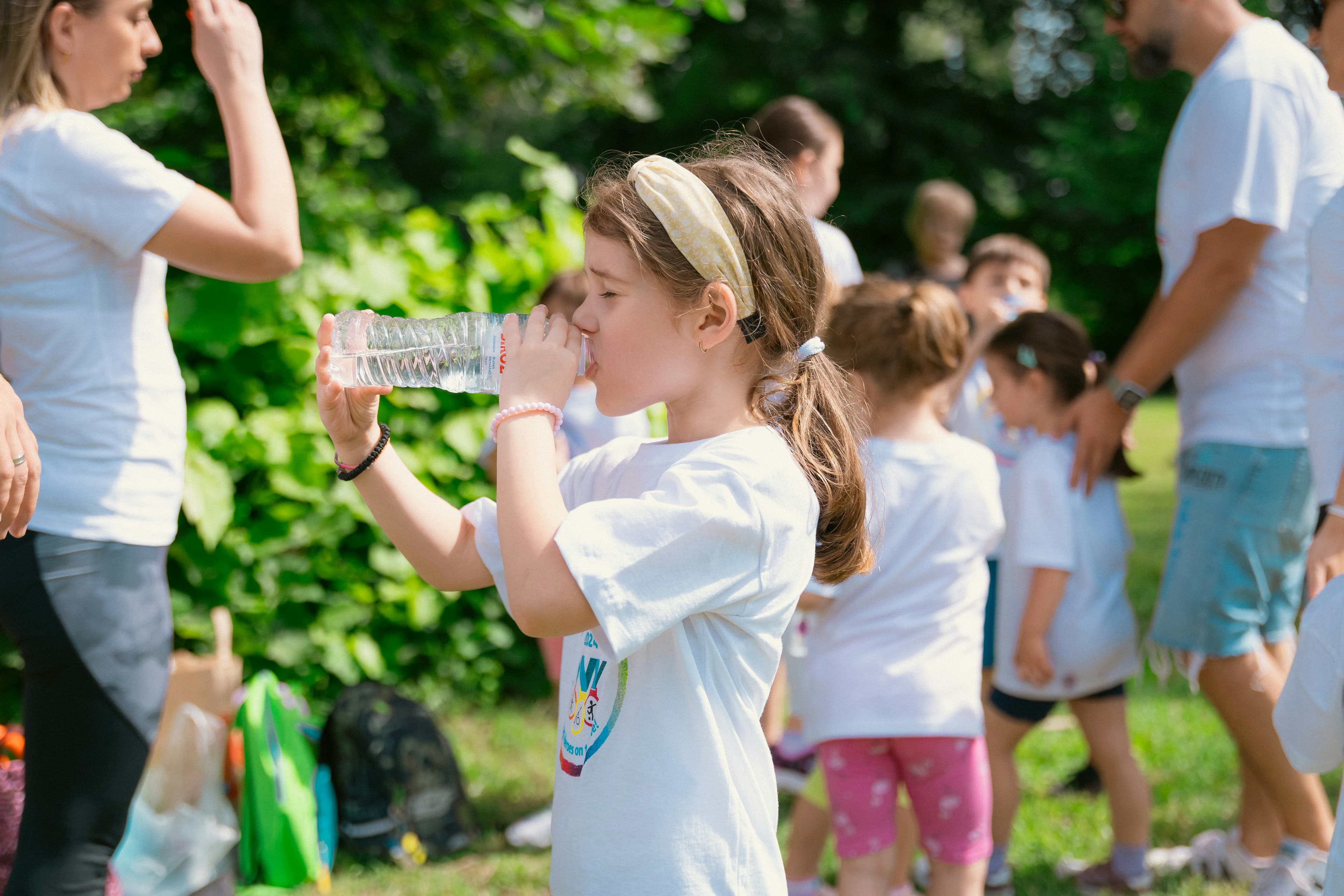 Girl drinking clean water — water quality education and guides